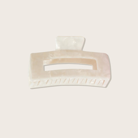 Pince à griffe blanche Pixie Woo pour cheveux, outil de coiffure élégant et pratique.