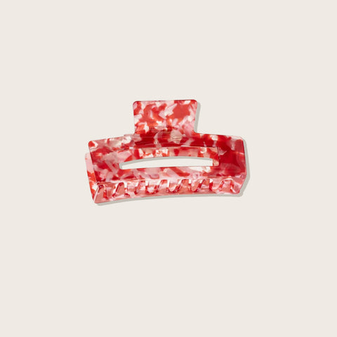 Pince à cheveux rouge Pixie Woo, pince à griffe pour coiffer les cheveux avec design élégant et pratique.
