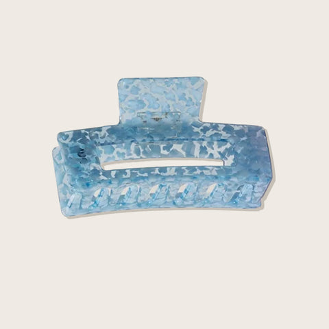 Pince à griffe bleue Pixie Woo pour cheveux, avec dents solides et poignée ergonomique, idéale pour coiffer et fixer les cheveux.