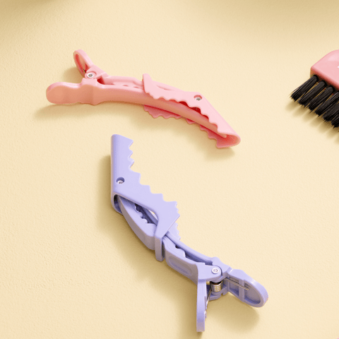 Clips jaw larges Maria Nila, lot de 4 clips professionnels pour cheveux, en plastique noir.