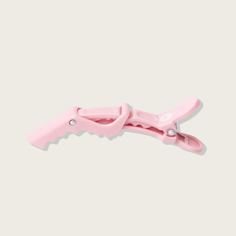 Petits clips Maria Nila Jaws, lot de 4, accessoires professionnels pour cheveux, en plastique noir, pour styling et fixation.