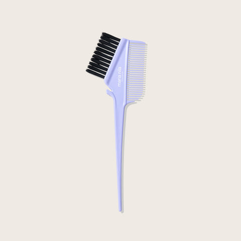 Brush with comb