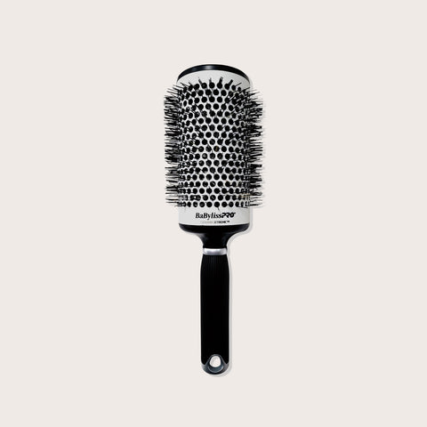 Brosse circulaire en céramique Babylisspro Xtreme XXL, outil de coiffure pour ondulations et volume.