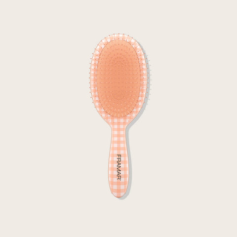 Brosse démêlante Framar Bell, outil de coiffure, avec poils souples pour démêler les cheveux en douceur, vue de face.