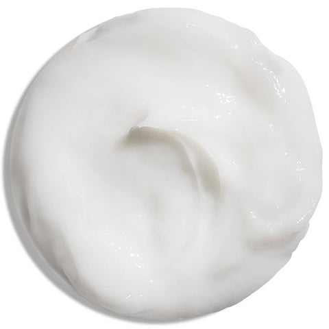 Revitalisant lissant Matrix Mega Sleek pour cheveux, flacon blanc avec bouchon noir et étiquette verte, visible dans l'image.