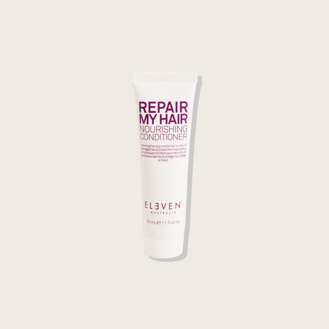 Revitalisant capillaire Repair My Hair de Eleven Australia, soin nourrissant pour cheveux abîmés, texture crémeuse et appliquée sur cheveux.