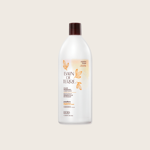 Revitalisant pour cheveux Bain de Terre Passion Flower, couleur vibrante, bouteille verte avec étiquettes colorées.