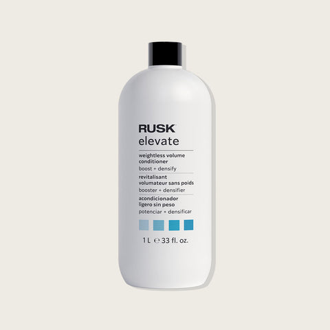 Revitalisant volume Rusk pour cheveux, texture légère et volumisante, visible dans le flacon avec formule sans poids.