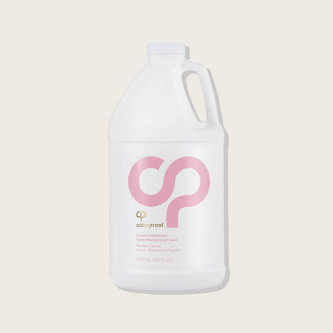 Revitalisant lissant pour cheveux Colorproof, texture douce et brillante, présenté dans un flacon élégant.