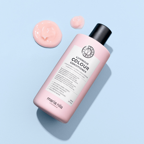 Revitalisant pour cheveux Maria Nila Luminous Colour, soin enrichi pour préserver la couleur et la brillance des cheveux.