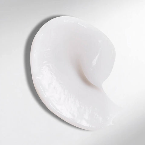 Revitalisant capillaire Wella Professionals Ultimate Smooth, 200 ml, pour cheveux lisses et soyeux, en flacon blanc.