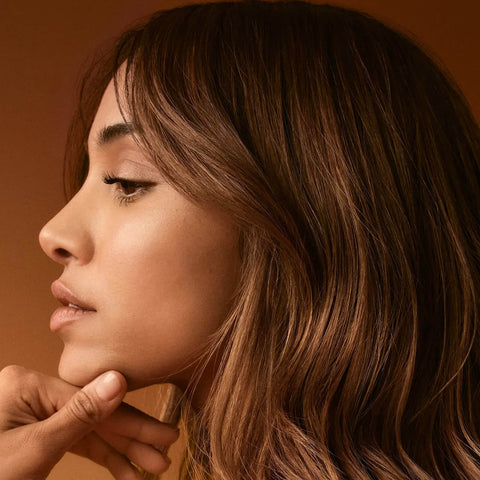 Revitalisant capillaire Wella Professionals Ultimate Smooth 200 ml, soin nourrissant pour cheveux lisses et brillants.