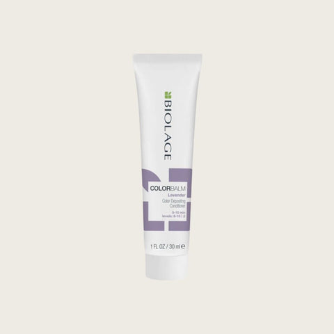 Soin revitalisant couleur Biolage Lavande pour cheveux de 30 ml, bouteille avec étiquette violette et bouchon blanc.