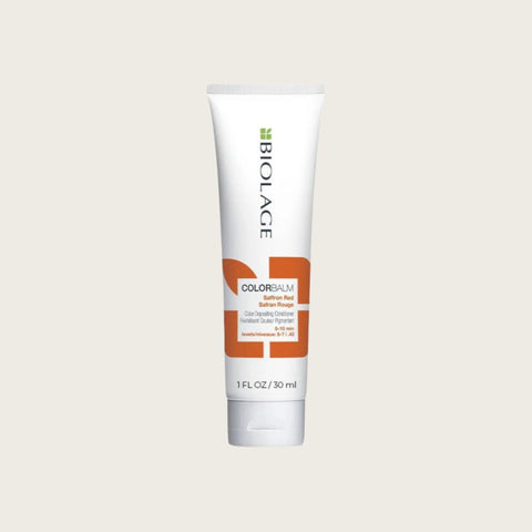 Soin capillaire revitalisant couleur Biolage Safran Rouge, flacon de 30 ml avec étiquette colorée et texture lisse