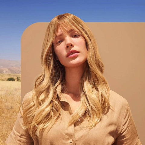 Après-shampooing Bond Therapy Biolage pour cheveux, flacon de 280 ml, texture crémeuse et soin réparateur capillaire.