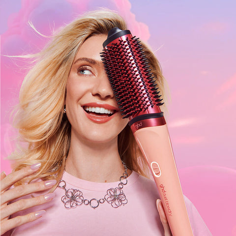 Sèche-cheveux GHD Styler à air chaud Duet avec étui édition limitée sunkissed peach, outil de coiffure élégant et pratique.
