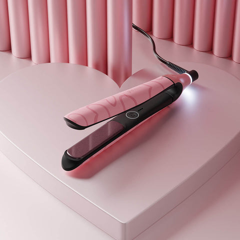 Lisseur GHD Chronos Rose Édition Limitée, outil de coiffure avec plaques en céramique, couleur rose, vue de face.