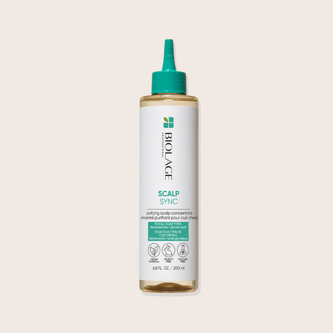 Flacon de 200 ml de Concentré Purifiant Biolage Scalp Sync pour cheveux, visible avec son étiquette et bouchon.