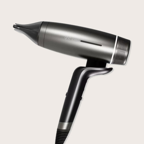 Sèche-cheveux GHD Speed noir titane, outil de coiffure professionnel avec design élégant et technologie de séchage rapide.