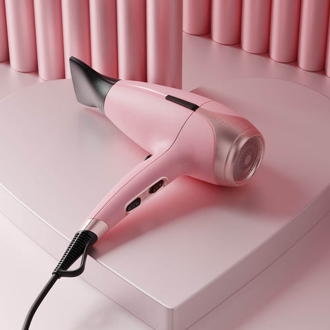 Séchoir GHD Helios rose Édition Limitée, outil de coiffure professionnel avec design élégant et finition brillante.