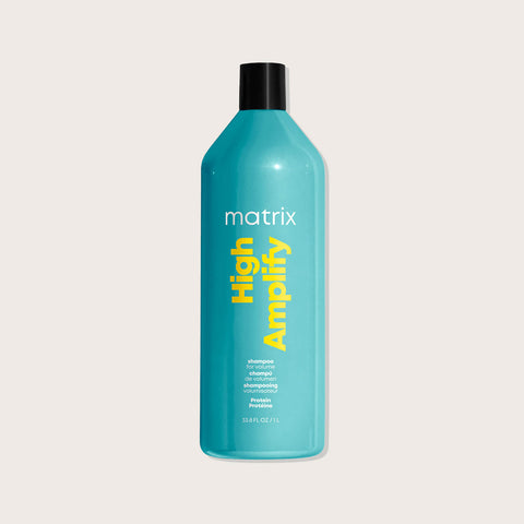 Shampooing volumisant Matrix High Amplify pour cheveux, bouteille élégante avec étiquette bleue.