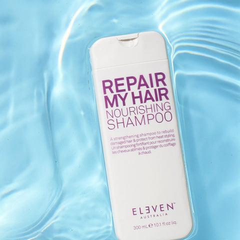 Shampooing réparateur pour cheveux Eleven Australia Repair My Hair, flacon de 300 ml visible.