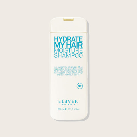 Shampooing hydrate pour cheveux Eleven Australia, texture riche et hydratante dans un flacon élégant.