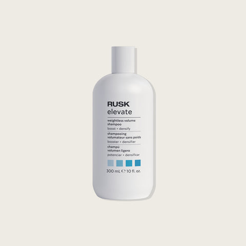 Shampoing volumisant Rusk Volume Elevate pour cheveux légers et volumineux, bouteille blanche avec pompe.