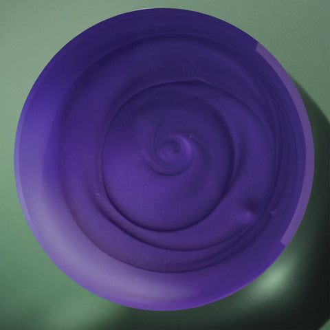 Shampoing neutralisant Color Last violet Biolage pour cheveux, bouteille d'un litre, avec étiquette violette visible.