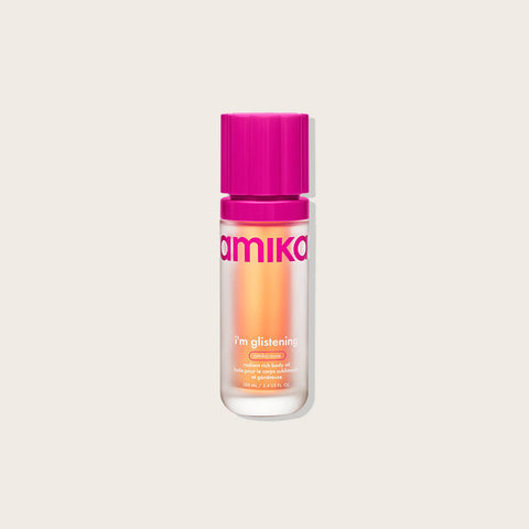 Huile pour le corps Amika I'm Glistening 100 ml, aspect brillant et hydratant, contenant des ingrédients nourrissants pour la peau