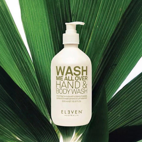 Gel nettoyant mains et corps Eleven Australia Wash Me All Over de 500 ml, flacon avec étiquette verte et liquide transparent