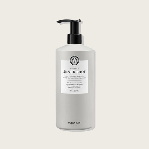 Bain violet Silver Shot de Maria Nila pour cheveux, liquide violet pour neutraliser les reflets jaunes.