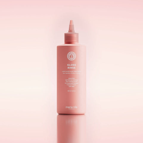 Soin capillaire Maria Nila Gloss Rinse, traitement brillance en flacon de 200 ml, cheveux éclatants et lisses.