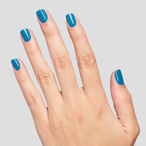 Vernis à ongles OPI Infinite Its in Your Jeans, couleur bleue denim, finition brillante, présenté sur un fond neutre.