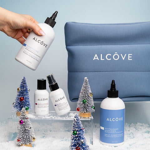 Coffret de soins capillaires Alcôve Routine Quotidien pour cheveux, boîte cadeau festive avec produits capillaires.