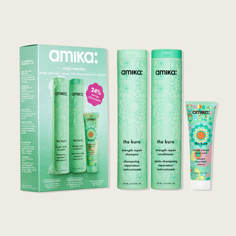 Trousse de printemps pour cheveux Amika The Kure avec produits capillaires en flacon blanc et packaging élégant.