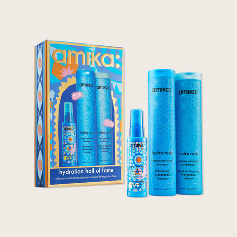 Coffret de soins capillaires Hydration Hall Of Fame Hydro Rush d'Amika avec produits pour cheveux hydratés et brillants.