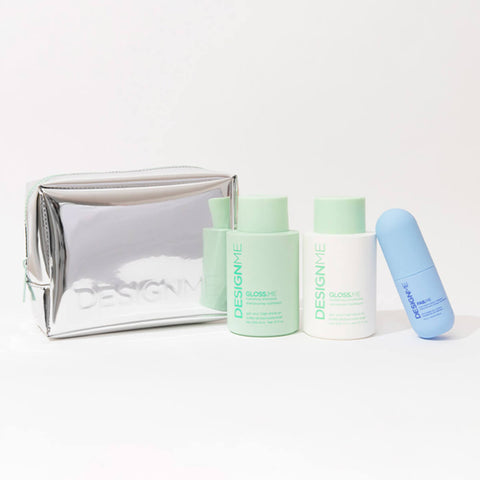 Coffret de fêtes GLOSS.ME signature de Design.Me, produits capillaires avec flacons colorés et design élégant.