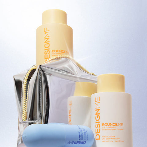 Coffret de fêtes DESIGN.ME BOUNCE.ME pour cheveux, contenant produits capillaires pour volume et style.