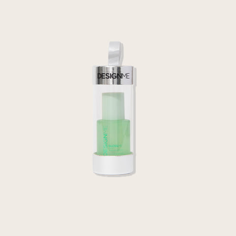 Huile de fête GLOSS.ME de Design.Me pour cheveux, flacon de 25 ml avec étiquette colorée et bouchon noir.