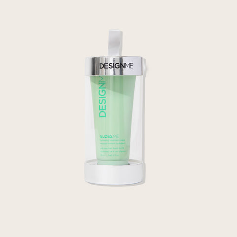 Masque hydratant pour cheveux GLOSS.ME de Design.Me dans un pot de 90 ml, avec un design festif et élégant.