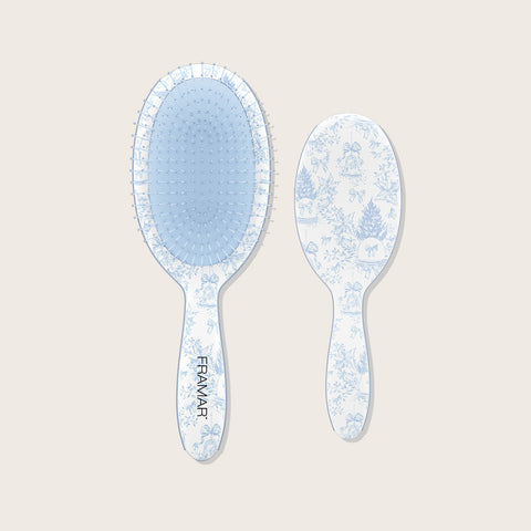 Coffret des fêtes Framar avec brosses professionnelles colorées, idéal pour la coiffure et la styling.