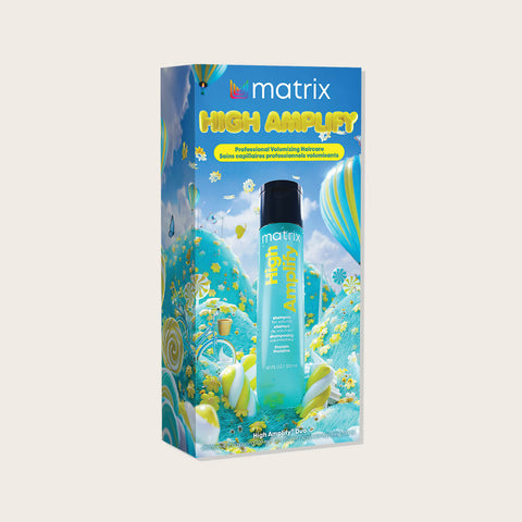 Coffret de fêtes Matrix High Amplify pour cheveux, contenant un spray volume de 300 ml, visible avec packaging élégant.