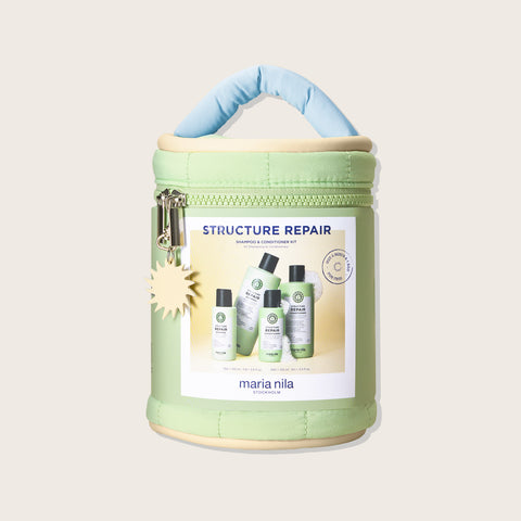 Trousse de beauté Maria Nila Structure Repair pour cheveux, contenant produits capillaires dans une trousse élégante.