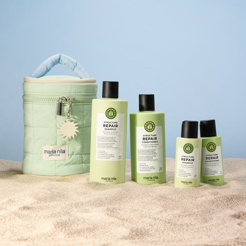 Trousse de beauté Maria Nila Structure Repair pour cheveux, comprenant produits capillaires dans une trousse élégante.