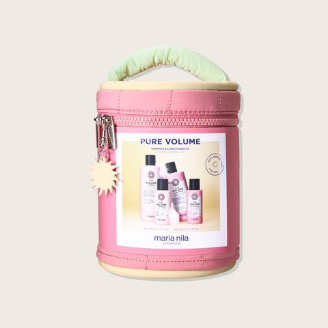 Trousse de beauté Maria Nila Pure Volume pour cheveux, contenant produits capillaires dans une trousse de rangement.