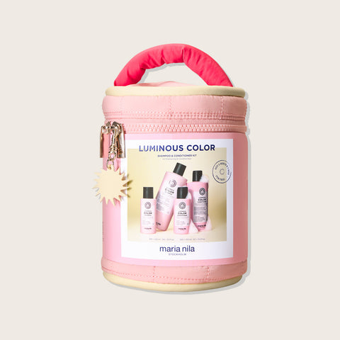 Trousse de beauté Maria Nila Luminous Colour pour soins capillaires, contenant des produits pour cheveux colorés.