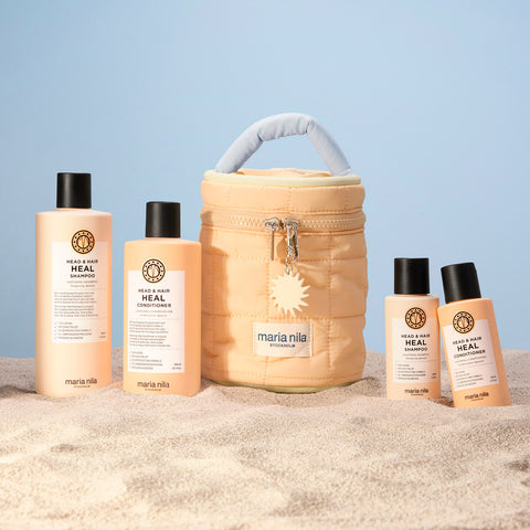 Trousse de beauté Maria Nila Head & Hair Heal avec produits capillaires pour soin des cheveux, dans une trousse pratique.